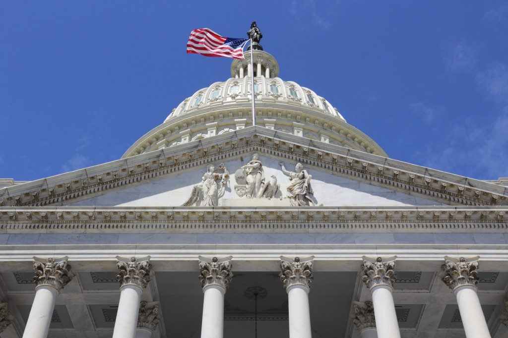 Washington DC, capital city of the United States. National Capitol building with US flag.