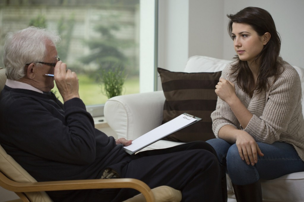 Civilian contractor talking to psychologist after returning from overseas.